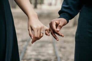 couple holding hands how to decide who to marry